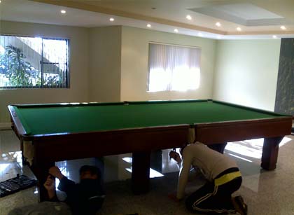 Pool Table Removalists reassembling a typical pub size 8 foot pool table Sydney