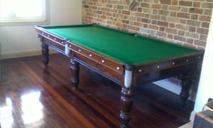 Billiard table removalists moving a 9 foot 3/4 size pool table